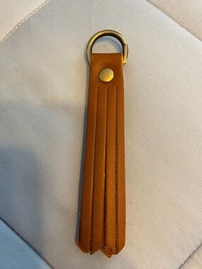 Golden brown (maybe Honey) Leather Tassel Keychain with Gold Ring